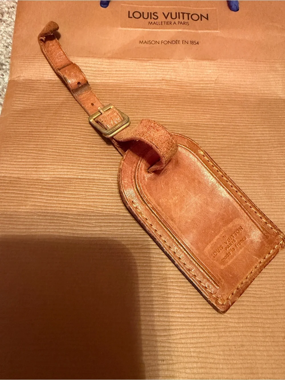 Louis Vuitton Leather Luggage Tag in Tan